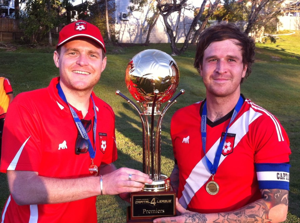 Senior Head Coach David Bounds with Club Captain Adam Hope collecting the minor premiership (Capital Four) trophy.